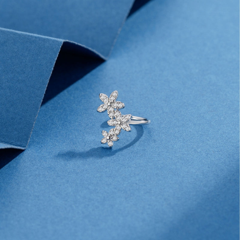 Three small flower-shaped zircon ear pendants with ear rings