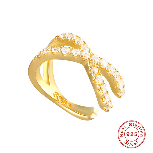 Design-inspired cross-set diamond stud earrings - a versatile and classic single piece