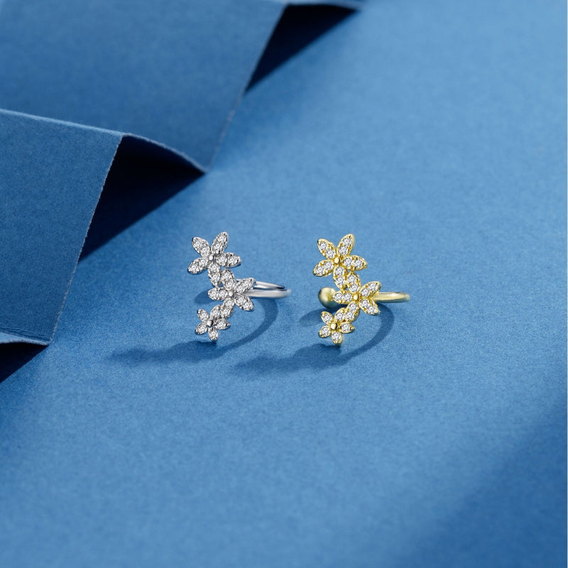 Three small flower-shaped zircon ear pendants with ear rings