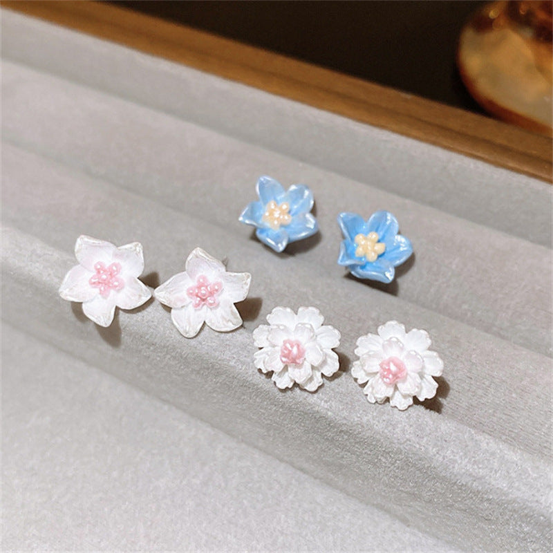 Simple, sweet and petite earrings for a cool and youthful schoolgirl look.