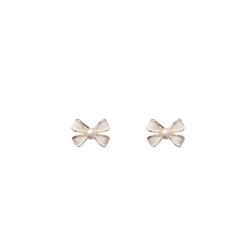 Luxury-lite bow-shaped pearl unique design ear clips